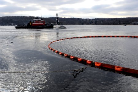 US Navy 100203-N-8467N-001 he Los Angeles-class attack submarine USS Philadelphia (SSN 690) pulls into Submarine Base New London after returning from her final deployment