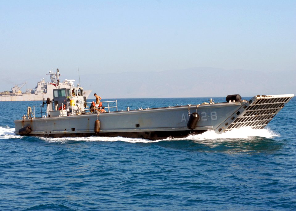 US Navy 100202-N-4971L-019 Assault Craft Unit 2 transports Sailor aboard USS Fort McHenry