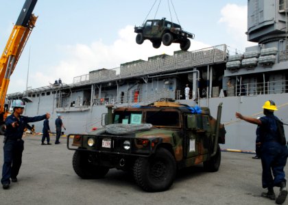 US Navy 100202-N-6692A-054 ailors assigned to the amphibious dock landing ship USS Harpers Ferry (LSD 49) unload vehicles and equipment from the 31st Marine Expeditionary Unit (31st MEU) at Sattahip, Thailand