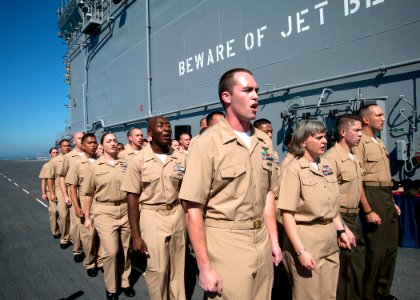 USS America pinning ceremony 140916-N-FR671-063