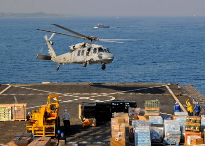 US Navy 100205-N-1082Z-005 An MH-60S Sea Hawk helicopter assigned to Helicopter Sea Combat Squadron (HSC) 28, takes off from the amphibious dock landing ship USS Ashland (LSD 48)