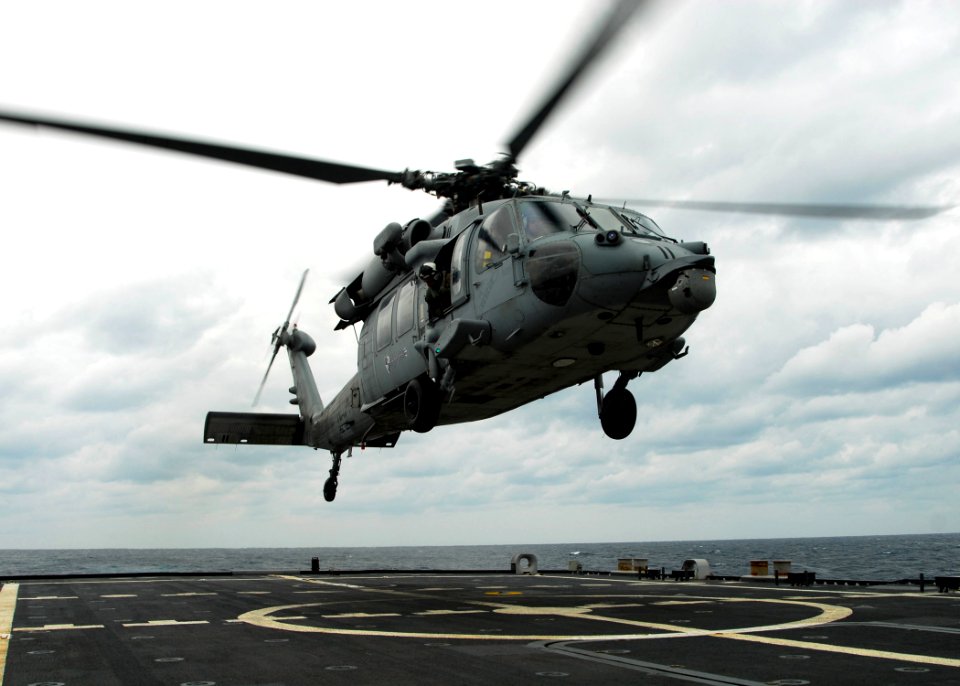 US Navy 100204-N-7058E-080 MH-60S Sea Hawk helicopter assigned to Helicopter Sea Combat Squadron (HSC) 22, lands on the littoral combat ship USS Freedom (LCS 1)
