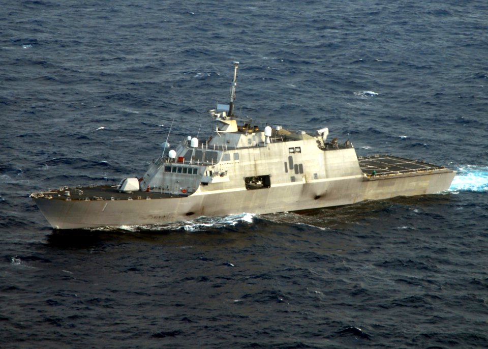US Navy 100203-N-7058E-546 The littoral combat ship USS Freedom (LCS 1) is underway off the coast of Florida at sunset during pre-deployment workups