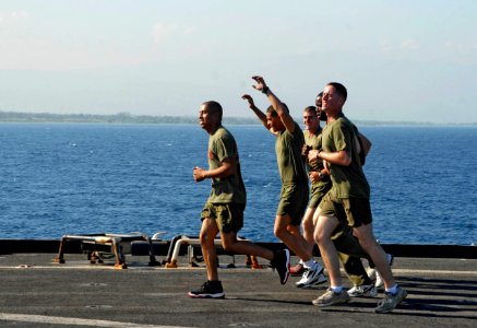 US Navy 100203-N-7653W-107 Marines jog aboard USS Fort McHenry