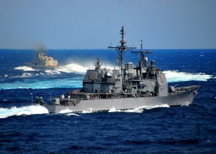 US Navy 100204-N-4774B-371 The guided-missile cruiser USS Bunker Hill (CG 52) performs maneuvers with the littoral combat ship USS Freedom (LCS 1) and the Nimitz-class aircraft carrier USS Carl Vinson (CVN 70)