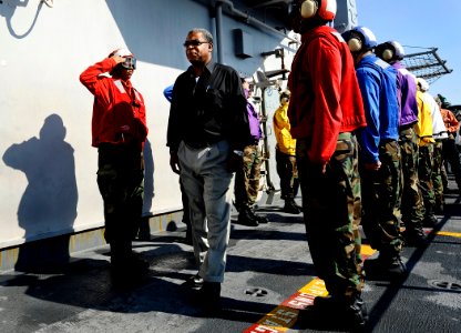 US Navy 100206-N-5345W-029 Haitian Prime Minister Jean-Max Bellerive receives honors from sideboys after arriving aboard the amphibious assault ship USS Bataan (LHD 5)
