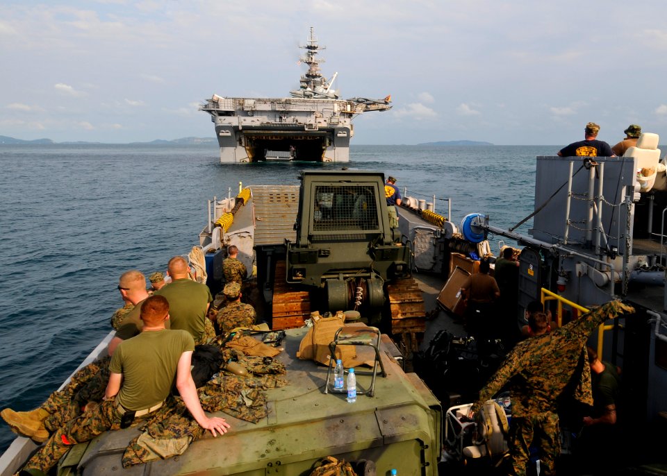 US Navy 100204-N-9950J-365 Marines assigned to the 31st Marine Expeditionary Unit return to the forward-deployed amphibious assault ship USS Essex (LHD 2) on a landing craft utility vehicle