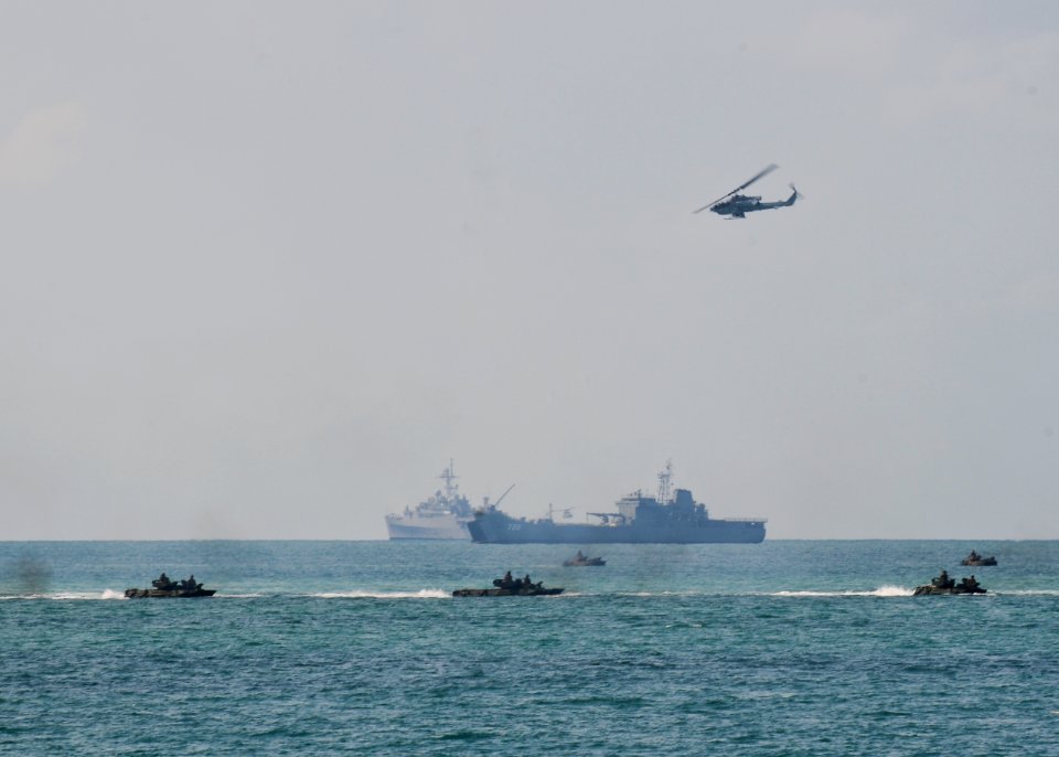 US Navy 100204-N-9950J-283 U.S. and Thai amphibious assault vehicles speed toward the beach during a simulated amphibious assault as part of exercise Cobra Gold 2010