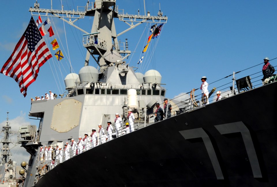 US Navy 100208-N-3666S-040 Sailors aboard the guided-missile destroyer USS O'Kane (DDG 77) man the rails