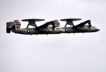 US Navy 100205-N-4774B-686 mdr. C. Wesley Bannister and Cmdr. Miguel Peko pilot E-2C Hawkeye aircraft during a change-of-command ceremony above the Nimitz-class aircraft carrier USS Carl Vinson (CVN 70)