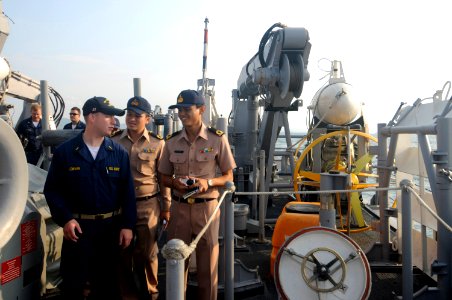 US Navy 100206-N-8335D-192 Ensign Kevin Lewman gives Royal Thai Navy officers a tour of the mine counter-measures ship USS Patriot (MCM 7) during exercise Cobra Gold 2010
