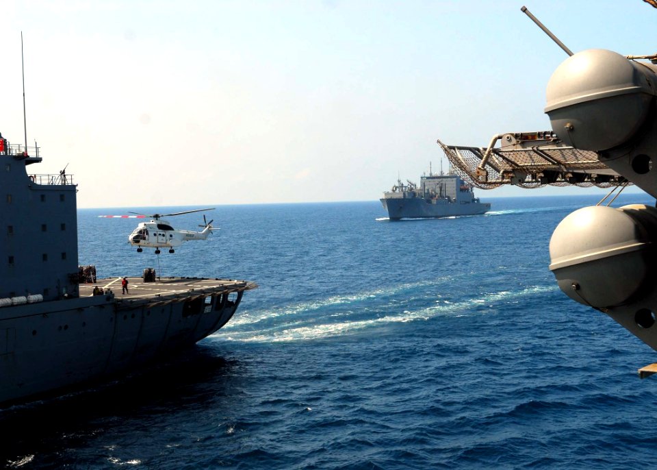 US Navy 100207-N-5148B-076 An SA-330J Puma helicopter picks up cargo from the Military Sealift Command dry cargo and ammunition ship USNS Robert E. Peary (T-AKE 5)