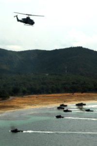 US Navy 100204-N-7843A-106 An AH-1W Super Cobra assigned to the Air Combat Element of the 31st Marine Expeditionary Unit (31st MEU) provides close air support to U.S. and Thai amphibious Assault vehicles