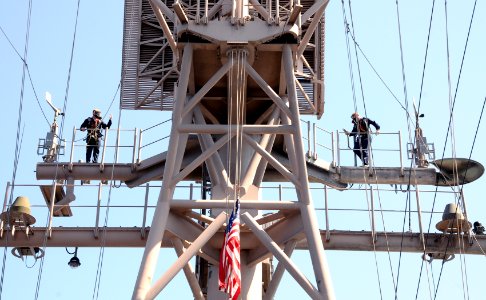 US Navy 100209-N-1831S-126 Interior Communications Electrician 2nd class Korey Bozeman and Interior Communications Electrician 2nd class Daniel Cordel perform maintenance aboard the multi-purpose amphibious assaults ship USS Ba