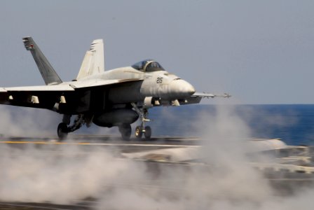 US Navy 100206-N-3327M-058 An F-A-18E Super Hornet assigned to the Tophatters of Strike Fighter Squadron (VFA) 14 launches from the aircraft carrier USS Nimitz (CVN 68)