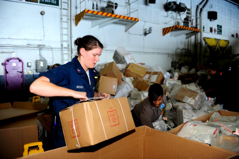 US Navy 100211-N-6604E-048 Sailors sort mail aboard USS Dwight D. Eisenhower