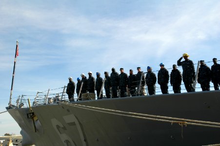 US Navy 100208-N-3154P-003 ailors man the rails aboard the Arleigh Burke-class guided-missile destroyer USS Cole (DDG 67), before they depart Naval Station Norfolk for a scheduled seven-month deployment