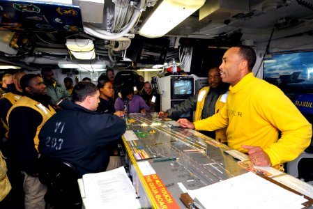 US Navy 100211-N-6003P-049 Lt. Alonzo Wynn gives a farewell speech to his department during his last underway aboard USS Harry S. Truman (CVN 75)