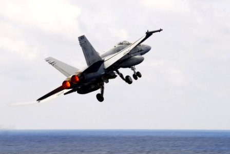 US Navy 100212-N-3327M-090 An F-A-18C Hornet launches from USS Nimitz (CVN 68)