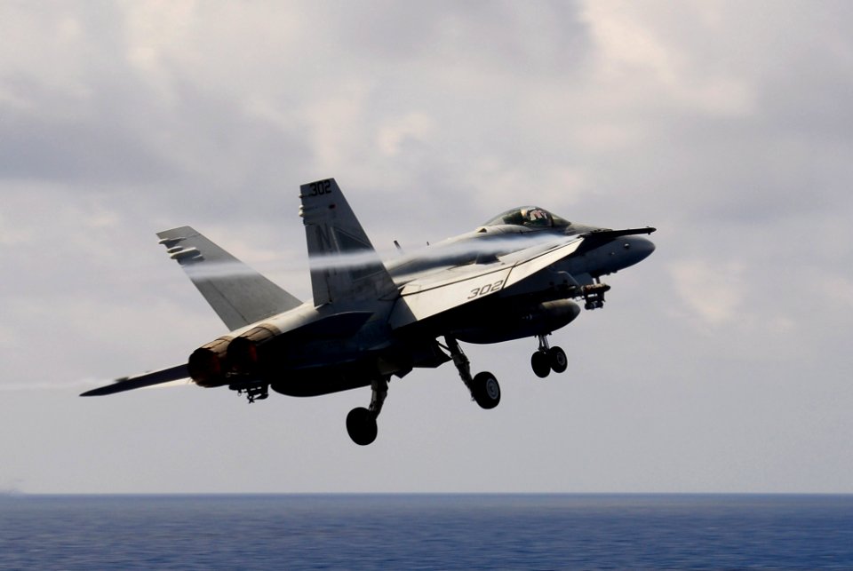 US Navy 100212-N-3327M-026 An F-A-18C Hornet launches from USS Nimitz (CVN 68)