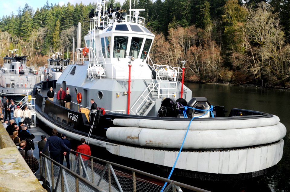 US Navy 100209-N-2143T-001 Rob Campbell, deputy program director of Navy Region Northwest Port Operations, delivers remarks during the activation ceremony for the new Navy tug boat Valiant (YT 802)