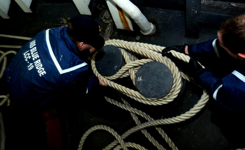 US Navy 100212-N-7280V-178 USS Blue Ridge secures mooring lines in Yokosuka, Japan