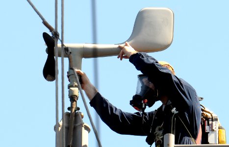 US Navy 100209-N-1831S-100 nterior Communications Electrician 2nd Class Korey Bozeman performs maintenance aboard the multipurpose amphibious assault ship USS Bataan (LHD 5)