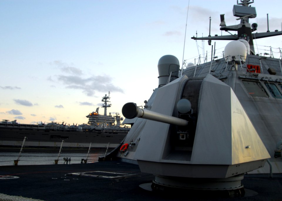 US Navy 100208-N-7058E-022 The littoral combat ship USS Freedom (LCS 1) enters Naval Station Mayport after completing final pre-deployment training and certification and transits past the aircraft carrier USS Carl Vinson (CVN 7