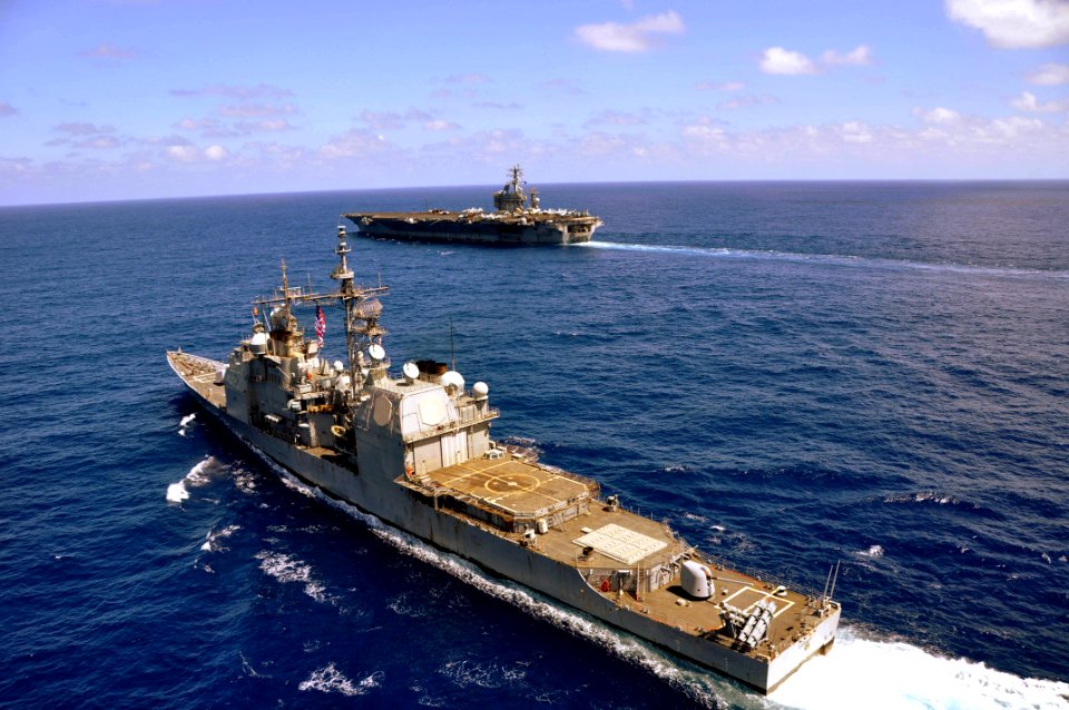 US Navy 100215-N-8421M-193 The aircraft carrier USS Nimitz (CVN 68) and the guided-missile cruiser USS Chosin (CG 65) operate in the South China Sea