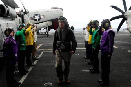US Navy 100216-N-3038W-297 Rainbow side boys render honors to Christopher J. Marut, acting consul general of the U.S. Consulate General in Hong Kong