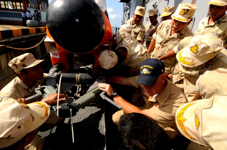 US Navy 100216-N-8335D-074 Chief Mineman William Brown shows Royal Cambodian Navy officers a mine-neutralization vehicle aboard the mine counter-measures ship USS Patriot (MCM 7)