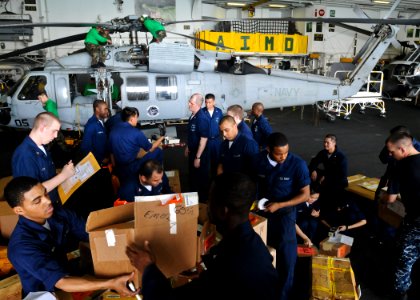 US Navy 100212-N-9950J-705 USS Essex Sailors sort mail