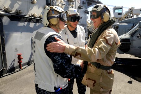 US Navy 100216-N-6604E-338 Rear Adm. Phillip S. Davidson and Capt. Dee L. Mewbourne greet Vice Chief of Naval Operations (VCNO) Adm. Jonathan W. Greenert