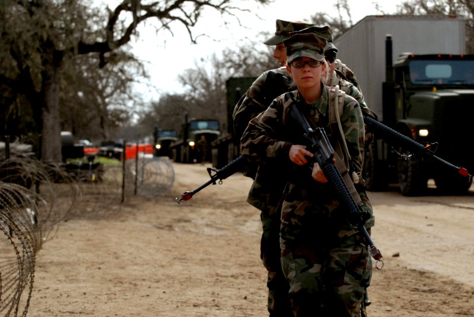 US Navy 100211-N-0475R-081 Construction Electrician Constructionman Apprentice Colleen Henry leads her squad during REACT Team training during Operation Bearing Duel 2010
