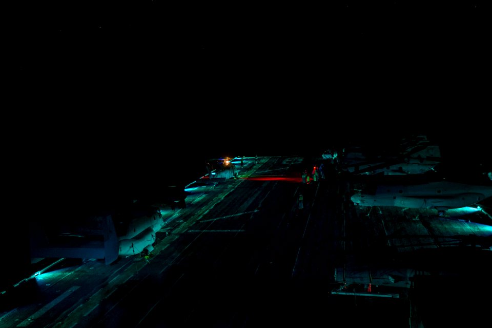 USS America night flight operations 140827-N-MZ309-044