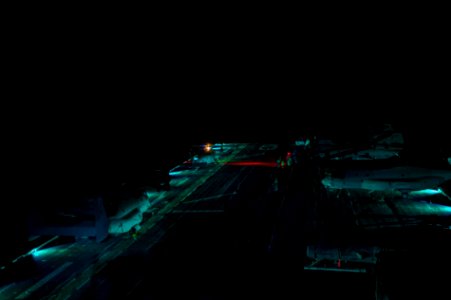 USS America night flight operations 140827-N-MZ309-044