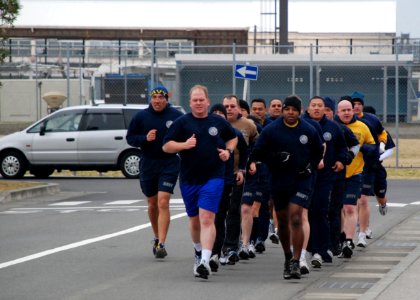 US Navy 100217-N-3283P-019 Members of the Far East Chief Petty Officer (CPO) Mess participate in the monthly CPO Pride Run photo