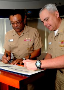 US Navy 100216-N-2259P-001 Vice Adm. D. C. Curtis and Rear Adm. Michael J. Lyden sign a Navy Enterprise Performance Based Agreement at Naval Surface Forces Headquarters photo