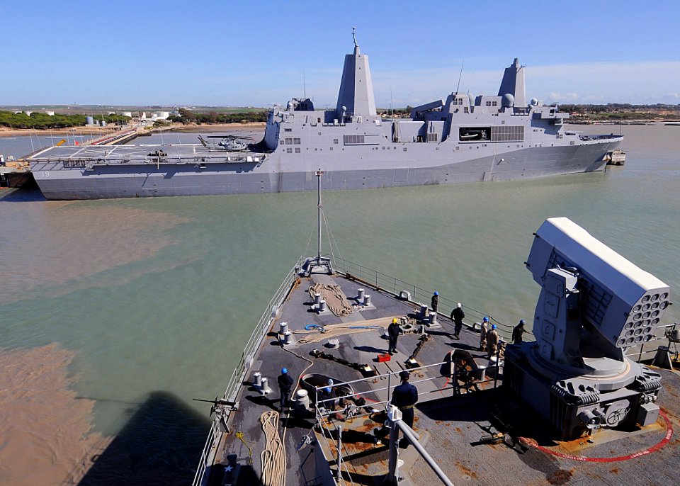 US Navy 100219-N-1082Z-013 The amphibious transport dock ship USS Mesa Verde (LPD 19) is moored pierside for a scheduled port visit as the amphibious dock landing ship USS Ashland (LSD 48) gets underway