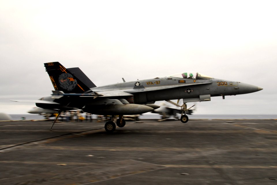 US Navy 100216-N-3327M-192 An F-A-18C Hornet assigned to the Warhawks of Strike Fighter Squadron (VFA) 97 lands aboard the aircraft carrier USS Nimitz (CVN 68)