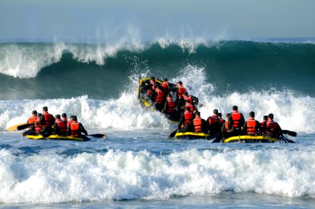 US Navy 100216-N-7883G-123 Basic Underwater Demolition-SEAL (BUDs) students participate in Surf Passage at Naval Amphibious Base Coronado photo