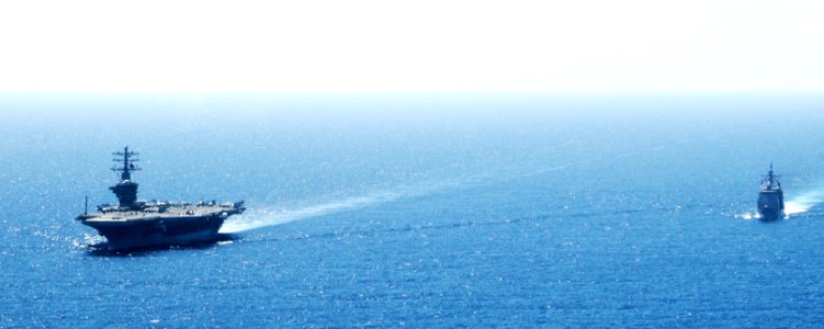 US Navy 100215-N-3038W-040 USS Nimitz (CVN 68) and USS Chosin (CG 65) operate in formation in the South China Sea