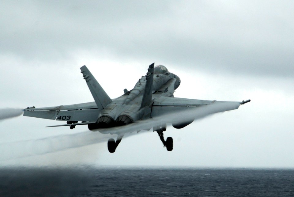 US Navy 100216-N-3038W-333 An F-A-18C Hornet assigned to the Sidewinders of Strike Fighter Squadron (VFA) 86 launches from the aircraft carrier USS Nimitz (CVN 68)