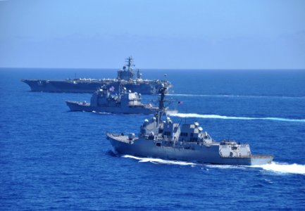 US Navy 100215-N-8421M-069 The aircraft carrier USS Nimitz (CVN 68), the guided-missile cruiser USS Chosin (CG 65) and the guided-missile destroyer USS Sampson (DDG 102) operate in formation in the South China Sea