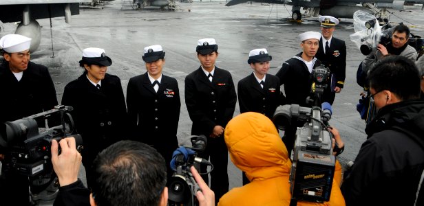 US Navy 100217-N-3038W-002 Sailors take part in a press conference during a scheduled port visit to Hong Kong aboard the aircraft carrier USS Nimitz (CVN 68)