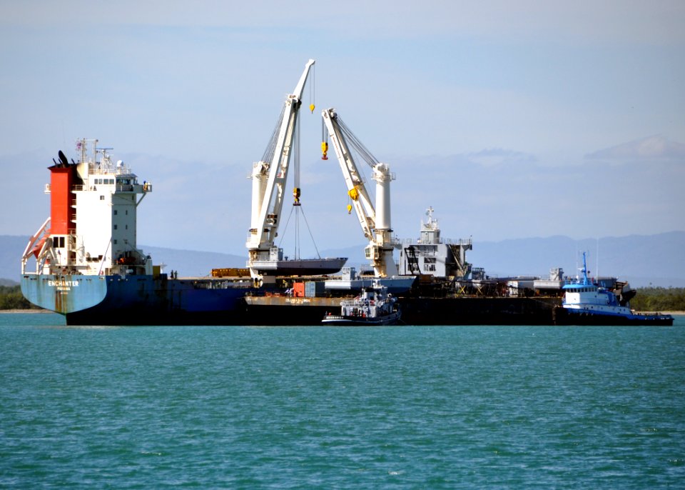 US Navy 100218-N-8241M-064 The contracted motor vessel (MV) Enchanter offloads four newly-acquired landing craft mechanized (LCM 8) at Naval Station Guantanamo Bay