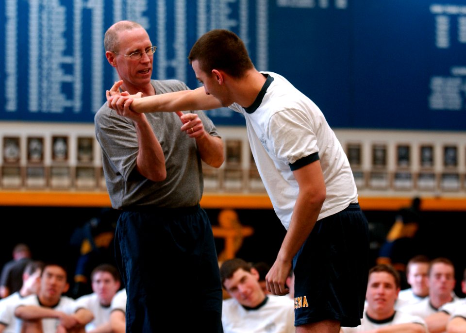 US Navy 100217-N-3857R-011 U.S. Naval Academy Professor James McNally demonstrates a wrist-lock technique for midshipmen