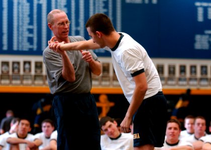 US Navy 100217-N-3857R-011 U.S. Naval Academy Professor James McNally demonstrates a wrist-lock technique for midshipmen