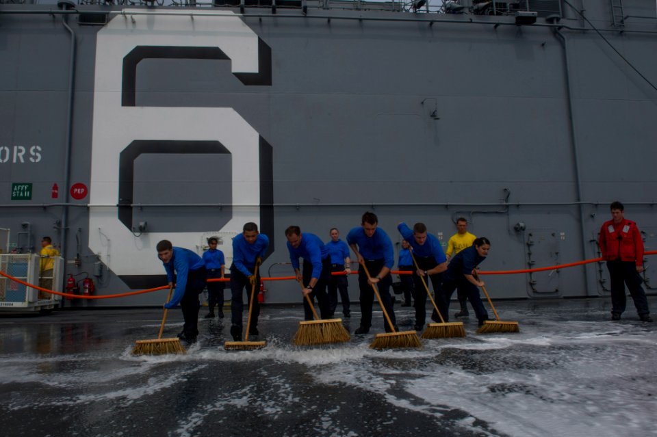 USS America deck scrubbing 140911-N-MZ309-056