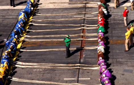 US Navy 100218-N-8822R-209 Aviation Boatswain's Mates assigned to the air department of the aircraft carrier USS Carl Vinson (CVN 70) conduct an aircraft barricade drill